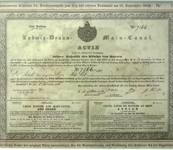 Das Abbild der Ludwigskanal-Aktie ist in der Bavarikon-Datenbank hinterlegt (Bayerisches Wirtschaftsarchiv Signatur: S36, 3903). https://www.bavarikon.de/object/bav:BWA-OBJ-000000000S363903